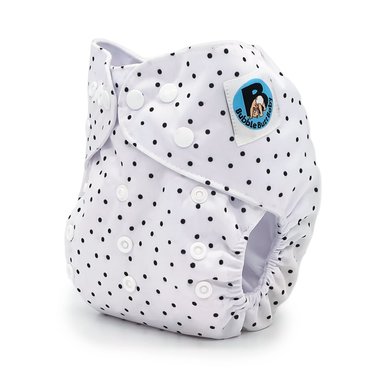 Side image of a pocket cloth diaper in the black and white polka dot pattern named Tiger Lily. Part of the Jolie Fleur Collection by Bubble Butt Baby.