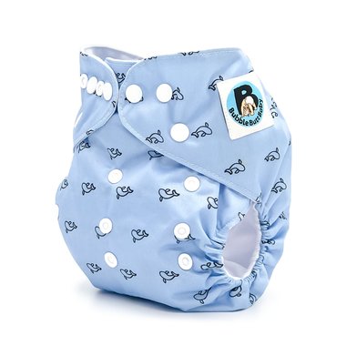 Side image of a blue pocket cloth diaper in the black whale pattern named Cetacea. Part of the Yachtsman Collection by Bubble Butt Baby.