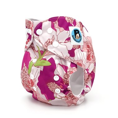 Side image of a purple and pink pocket cloth diaper in the floral pattern named Hibiscus. Part of the Jolie Fleur Collection by Bubble Butt Baby.