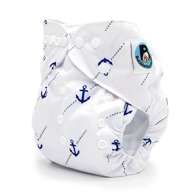 Side image of a white pocket cloth diaper in the blue anchor pattern named Ancora. Part of the Yachtsman Collection by Bubble Butt Baby.